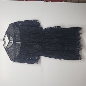 Little black lace lined dress.  Size s.  Super cute.  Never worn.